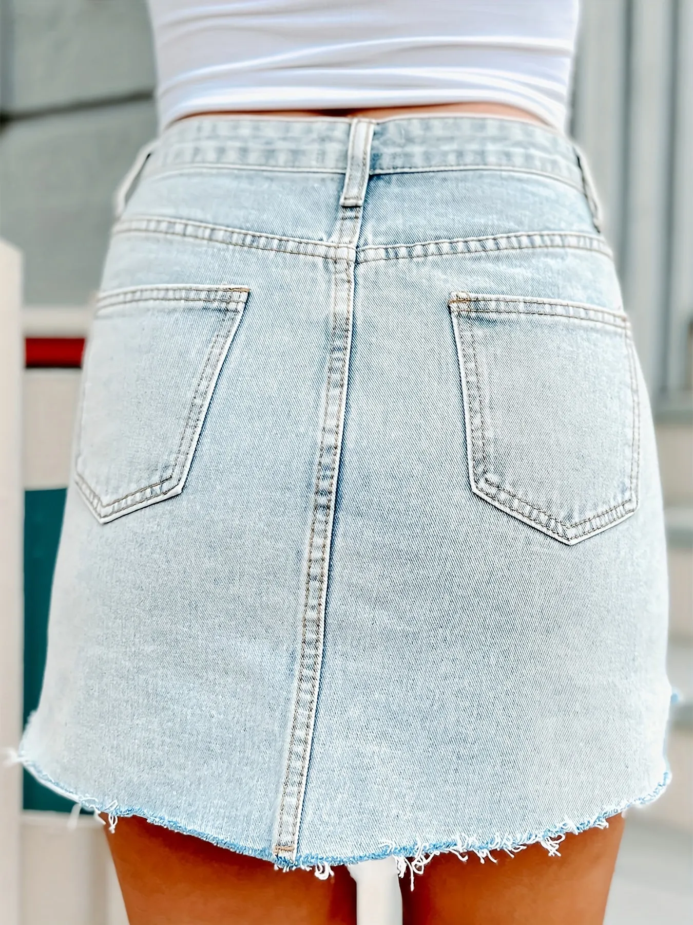 High-Rise Light Washed Blue Mini Denim Skirt with Multi Buttons and Slash Pockets - Raw Hem, Streetwear Inspired, Womens Fitted Jeans Clothing - Perfect for Casual Daily Wear